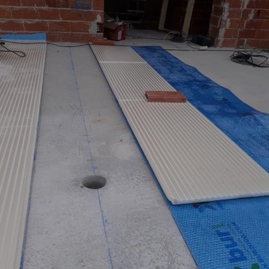 THERMAL AND ACOUSTIC INSULATION ON A FLAT PASSABLE TERRACE